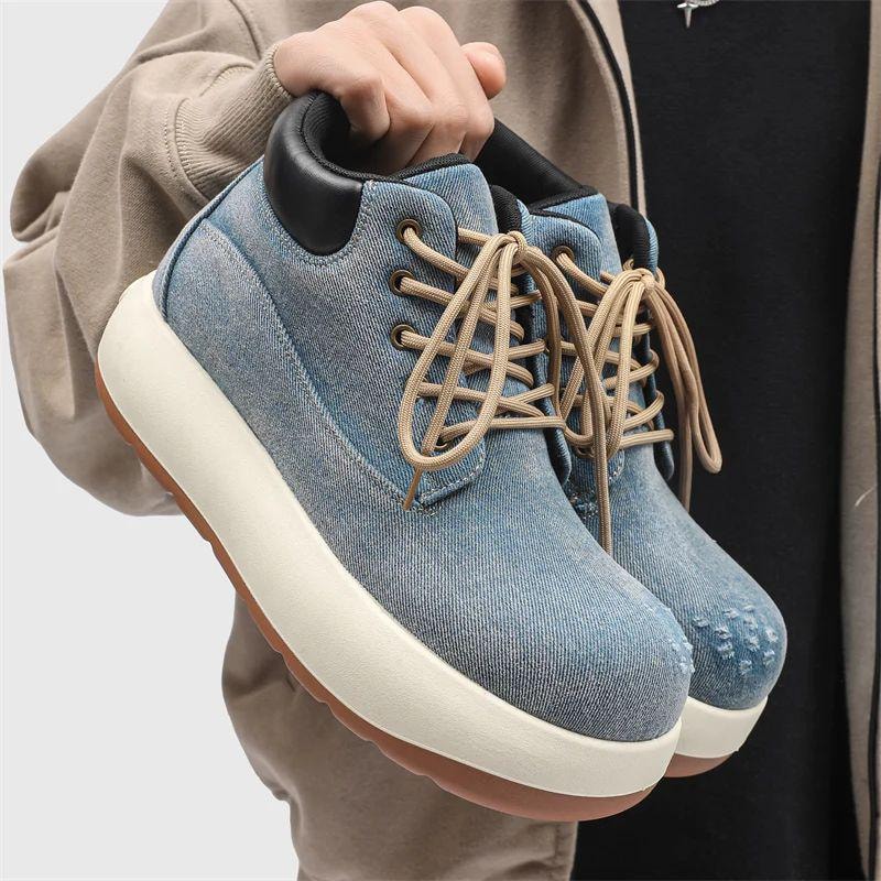 Light blue denim chunky platform sneaker held by the collar showing side and front profile.