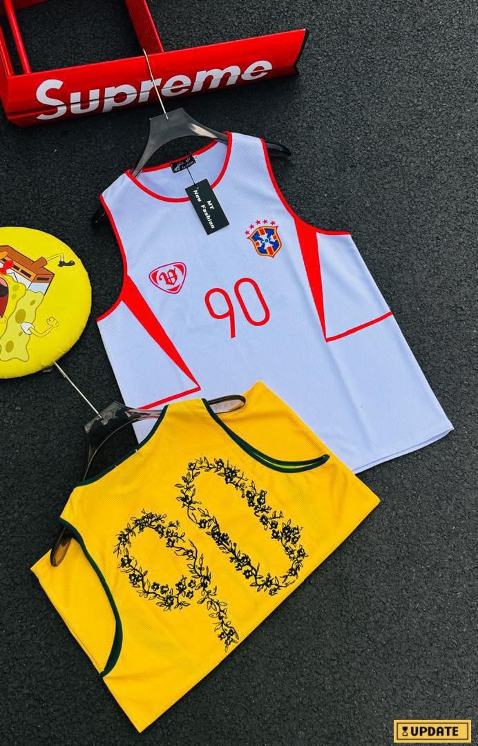 White Brazil 90 armless tank top with red trim and crest logo.