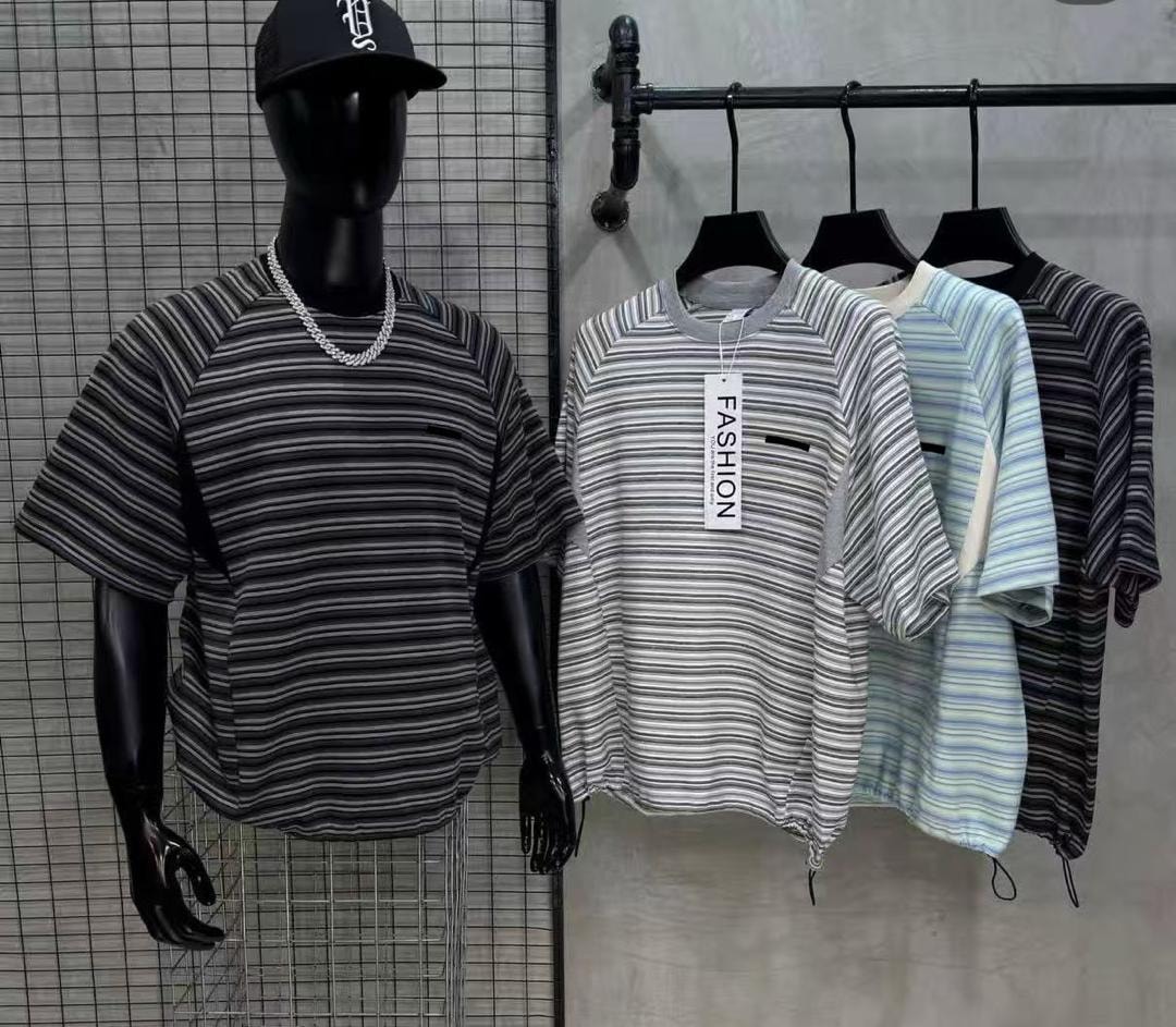 Four colorways of striped short sleeve polo shirts shown on mannequin and hangers with horizontal stripes and chest pockets.